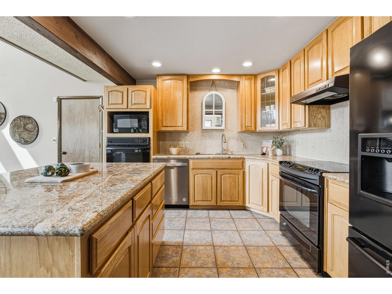 Property Photo 17 Ample cabinetry and functional layout for everyday living.