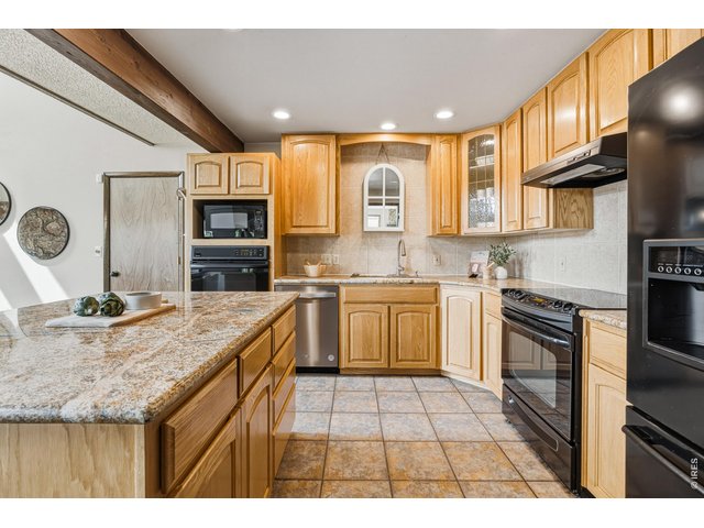 Property Photo 17 Ample cabinetry and functional layout for everyday living.