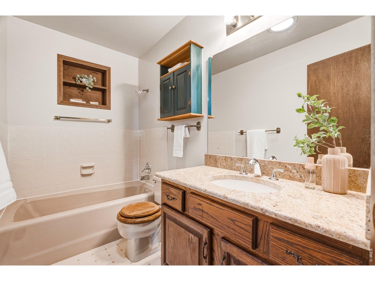 Property Photo 35 Full bathroom with tub/shower combo and vanity.