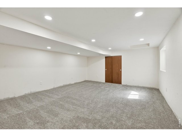 Property Photo 47 Basement bedroom with natural light and generous space for guests, home office or work out space.