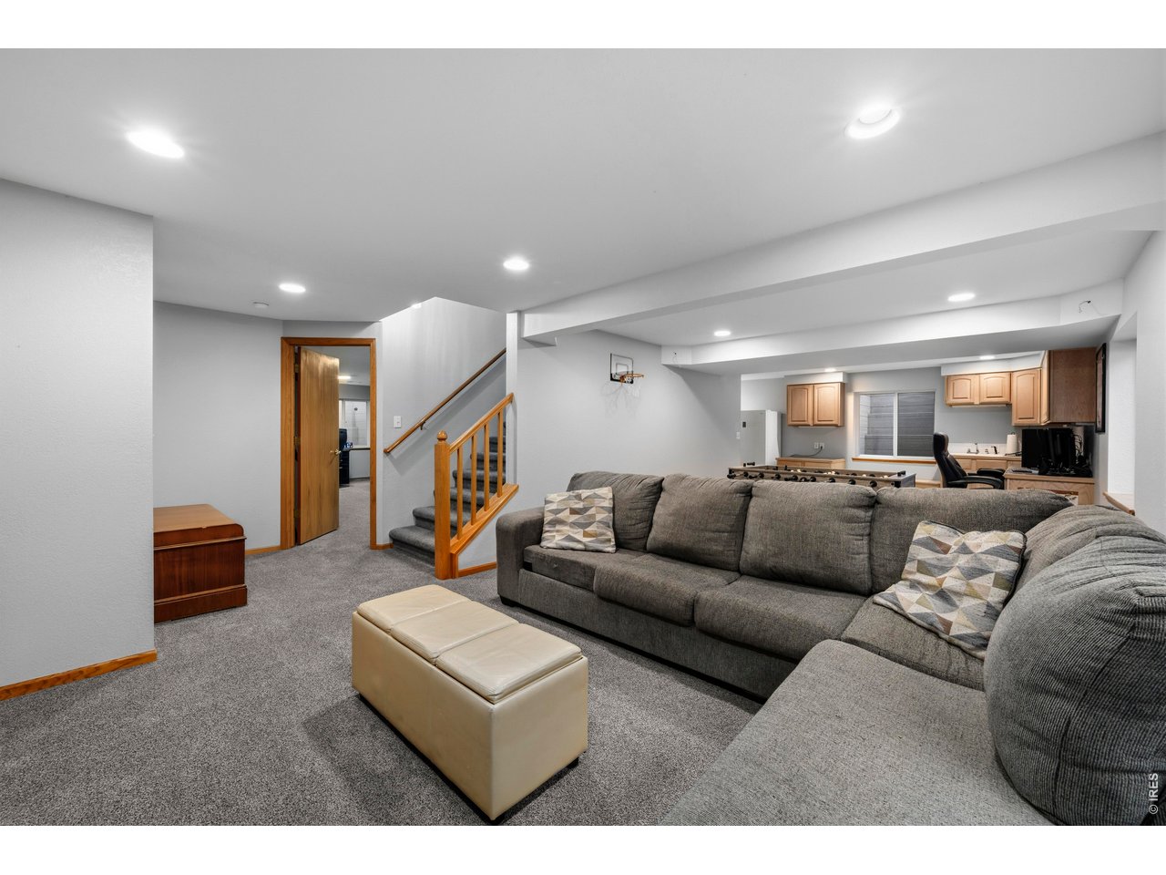 Property Photo 32 Fully finished basement with rec room, bar area/workspace, and additional bedroom and bathroom