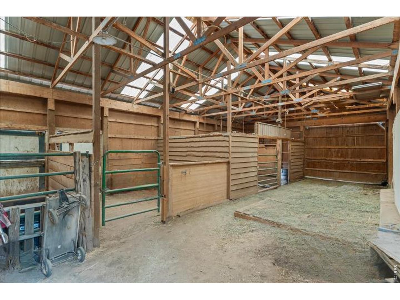 Property Photo 4 4-Stall Barn with Hay Storage, Electrical and access to connected future corral area.