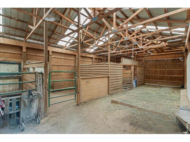 Property Photo 4 4-Stall Barn with Hay Storage, Electrical and access to connected future corral area.