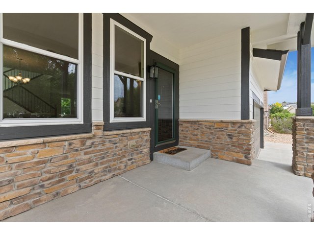 Property Photo 3 Shady front covered patio
