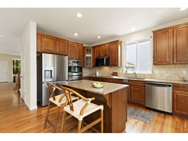 Property Photo 10 Rich cabinets, granite counters, stainless appliances