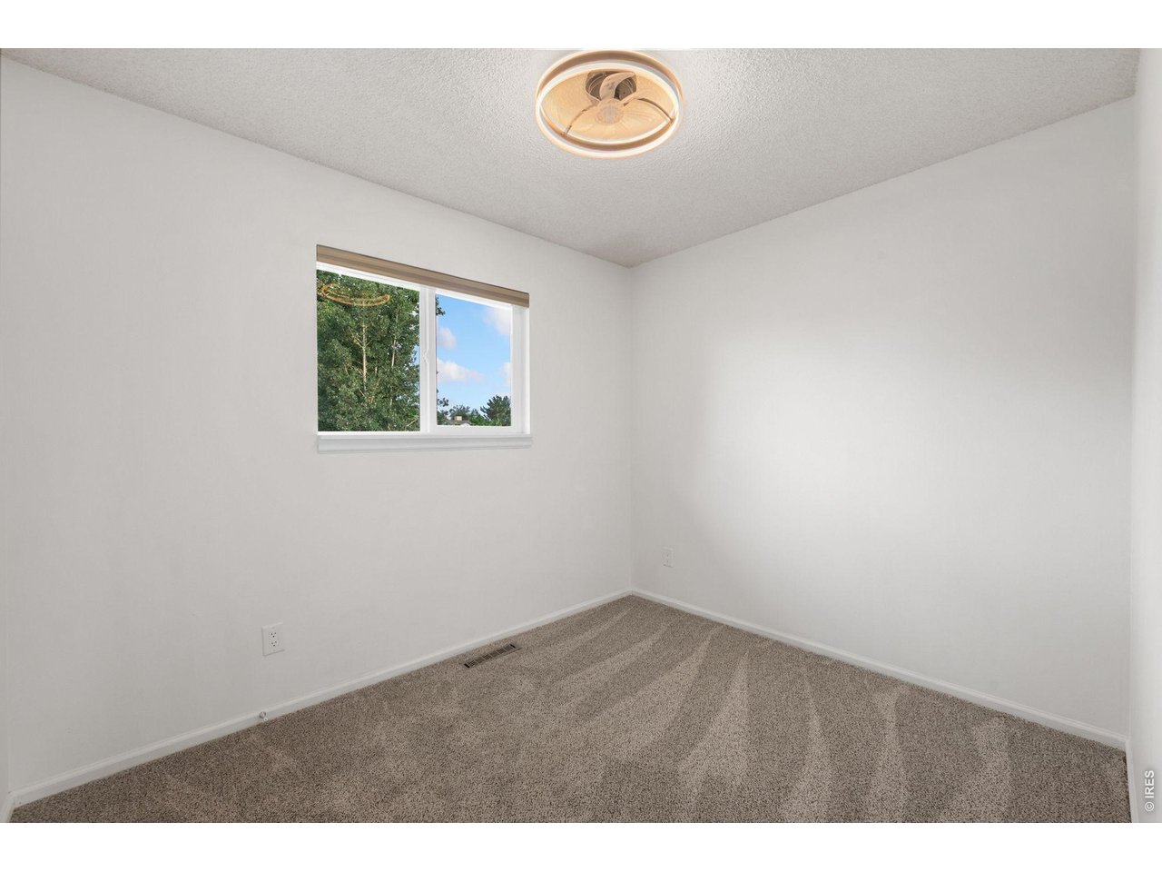 Property Photo 21 Additional upstairs bedroom has a cozy feel.