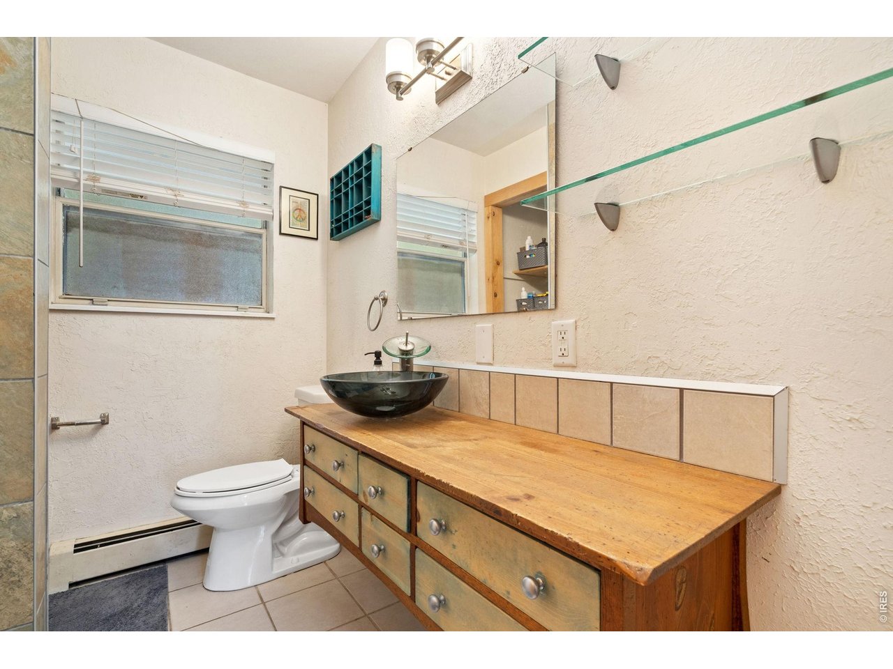 Property Photo 13 Upstairs bath. Remodeled with custom vanity.