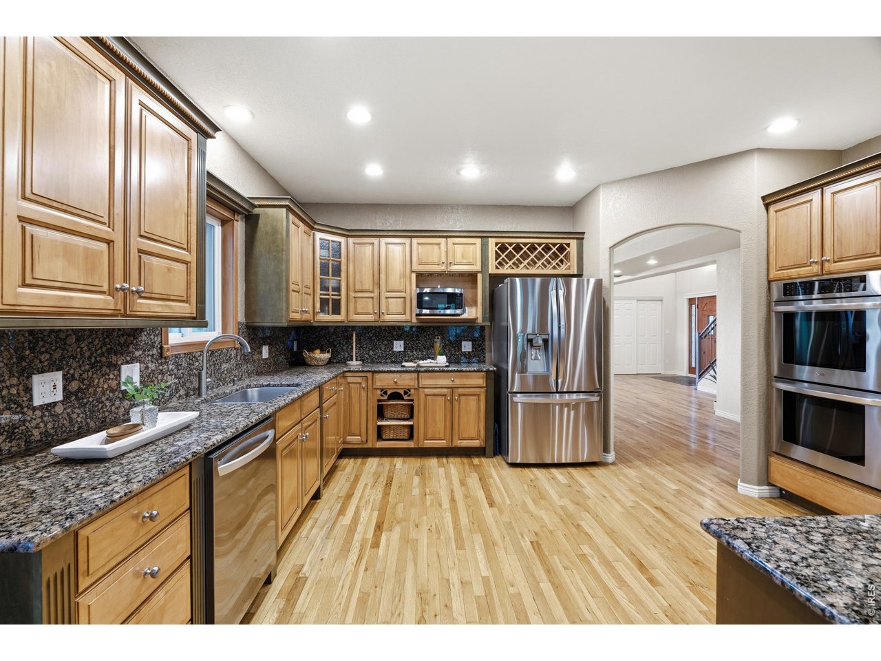 Property Photo 11 Stainless appliances, double ovens, and a built-in wine rack.