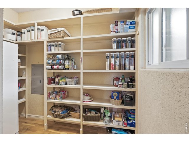 Property Photo 14 Oversized walk-in pantry with plenty of storage and extra freezer.