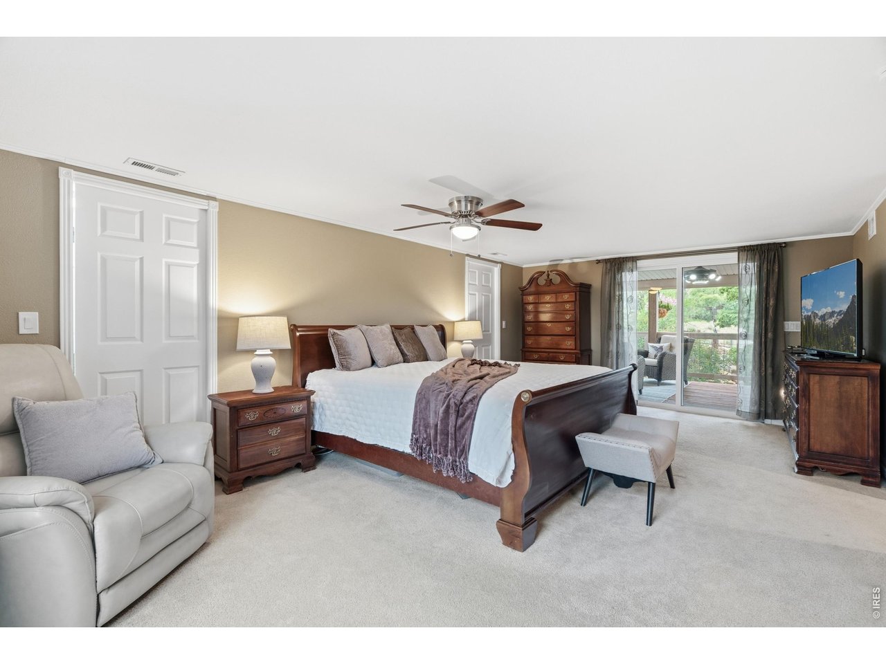 Property Photo 18 The primary bedroom offers two closets and room for a seating area.