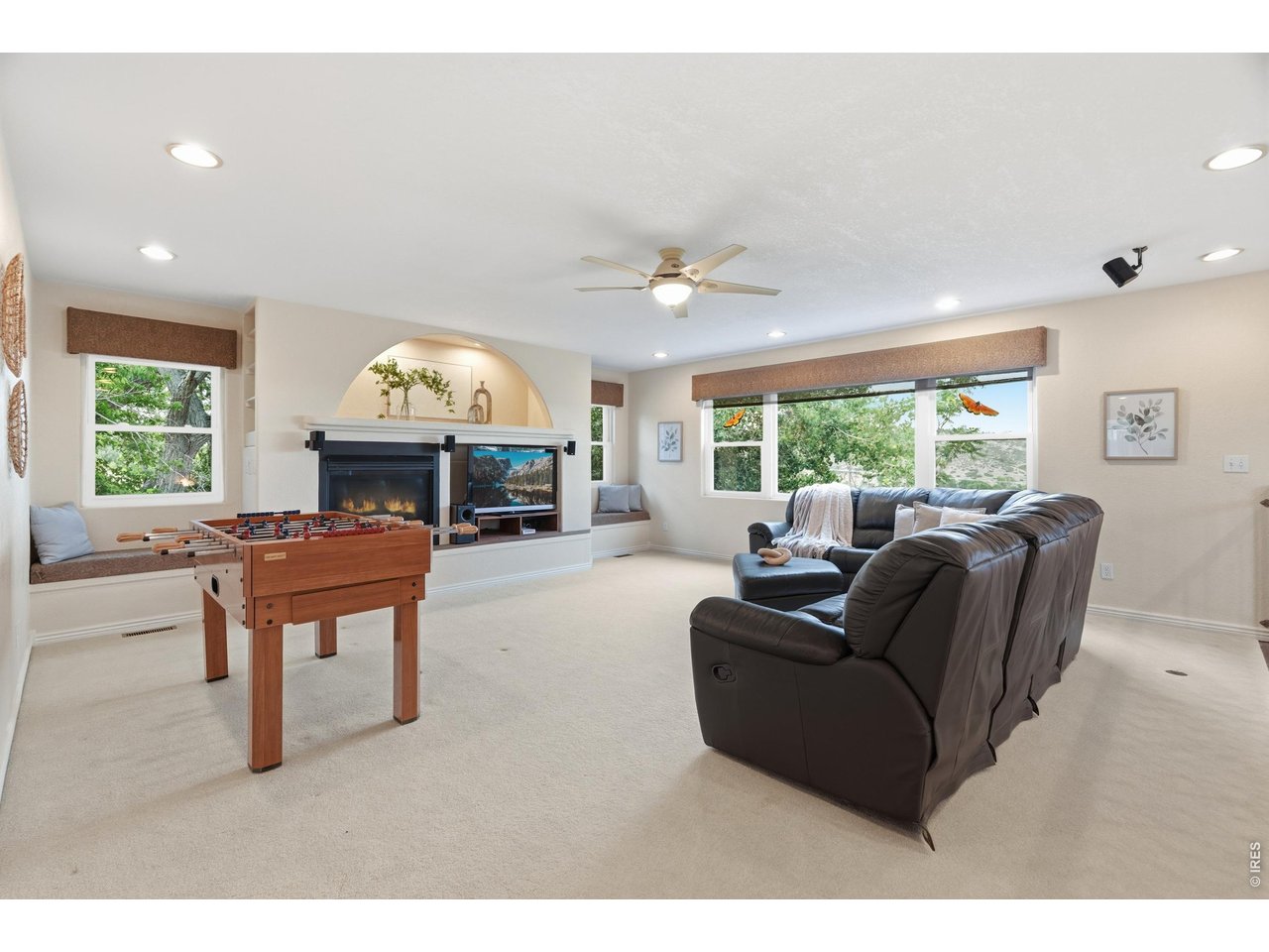 Property Photo 26 The loft is big enough for a game area and a full seating group at once.