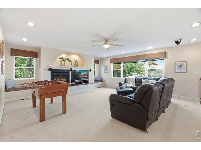 Property Photo 26 The loft is big enough for a game area and a full seating group at once.