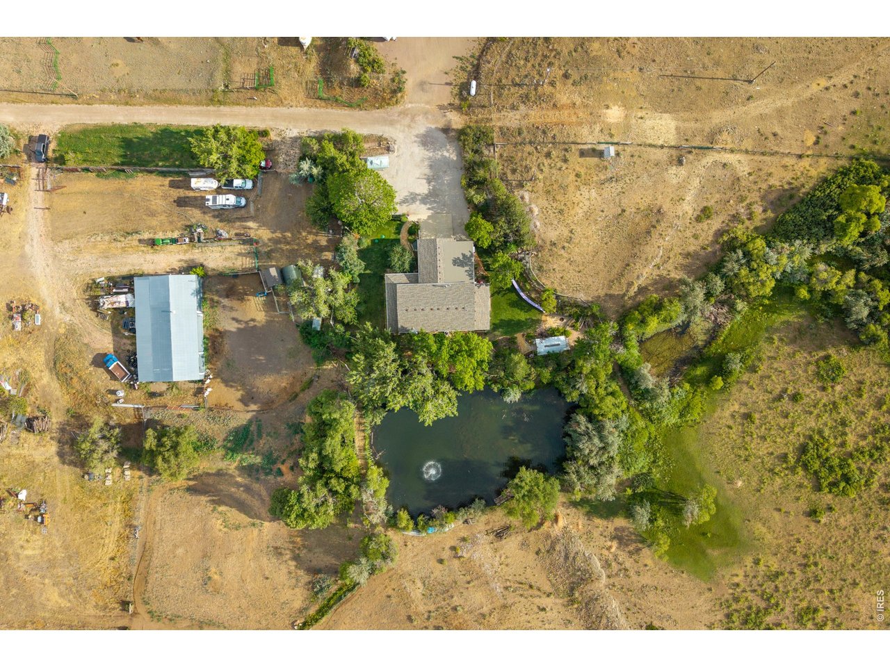 Property Photo 44 Directly overhead: the home, pond, and equipment building on 10.3 acres.