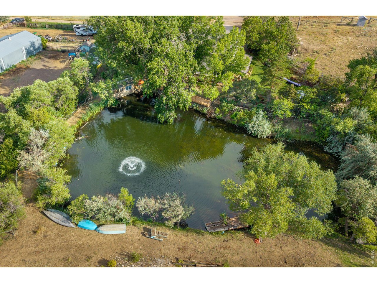 Property Photo 4 Pond with water feature.