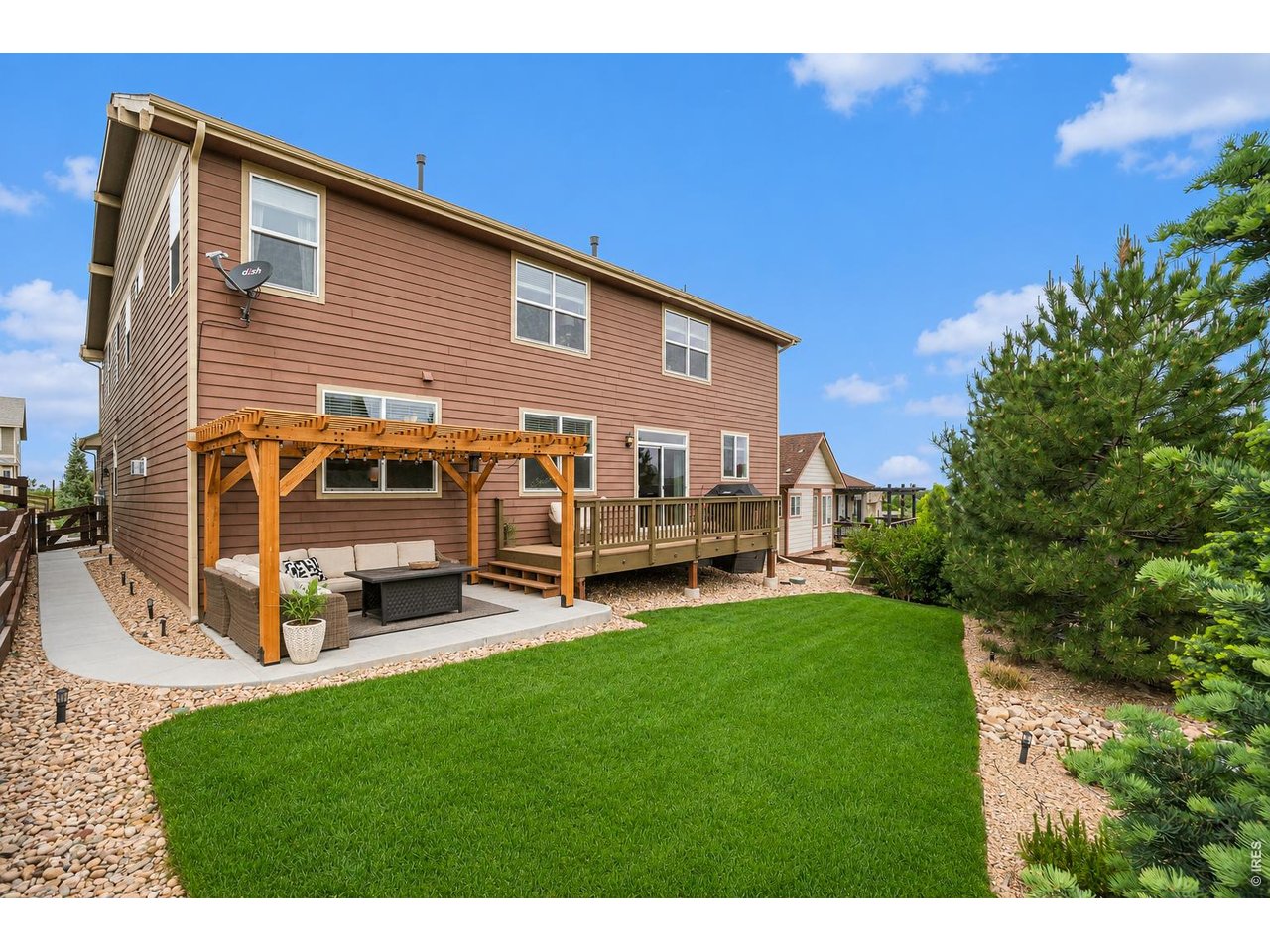 Property Photo 40 Backyard with pergola deck and patio space