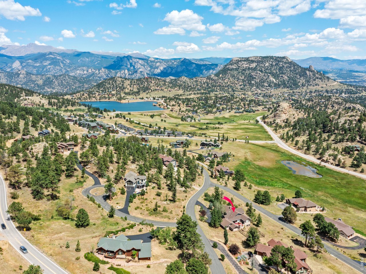Property Photo 7 Situated on a private one-acre setting just minutes from Estes Park and Rocky Mountain National Park, this extraordinary property delivers the perfect balance of luxury, privacy, and mountain adventure.