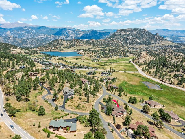 Property Photo 7 Situated on a private one-acre setting just minutes from Estes Park and Rocky Mountain National Park, this extraordinary property delivers the perfect balance of luxury, privacy, and mountain adventure.
