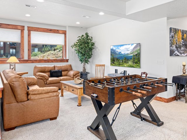 Property Photo 38 Abundant open space easily accommodates a billiards table, foosball, table tennis, home gym, or media room.