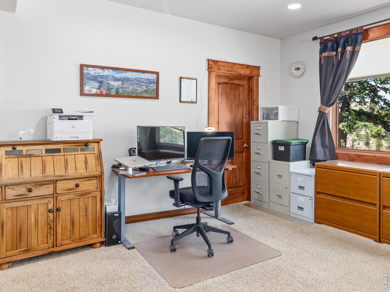 Property Photo 43 More than 900 square feet of unfinished storage offers endless possibilities for a workshop, fitness room, hobby space, or future expansion.