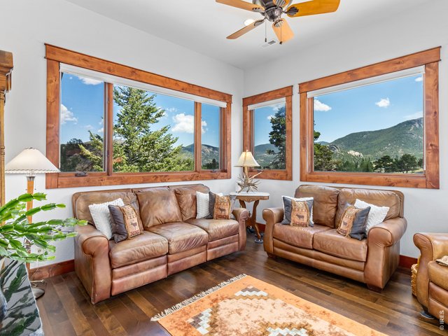 Property Photo 15 Additional sitting room with expansive windows create a stunning backdrop.