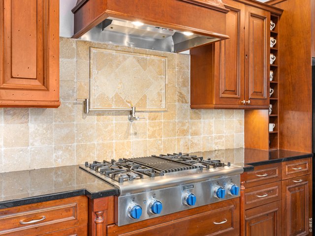 Property Photo 21 Thermador range with pot filler