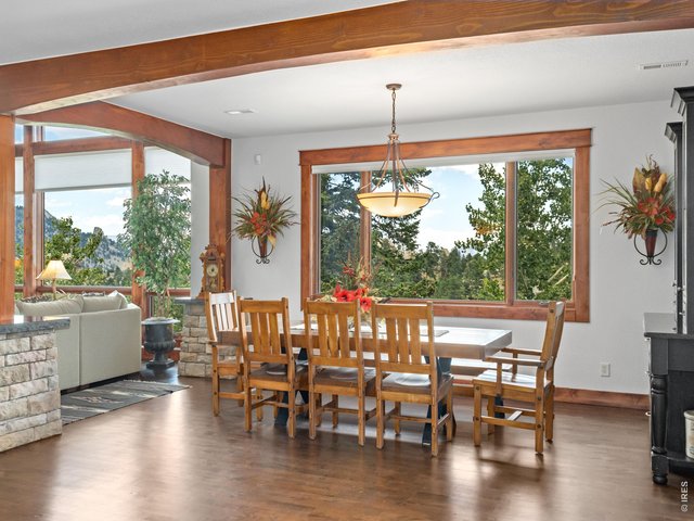 Property Photo 13 Beautiful wood floors throughout the main living space.
