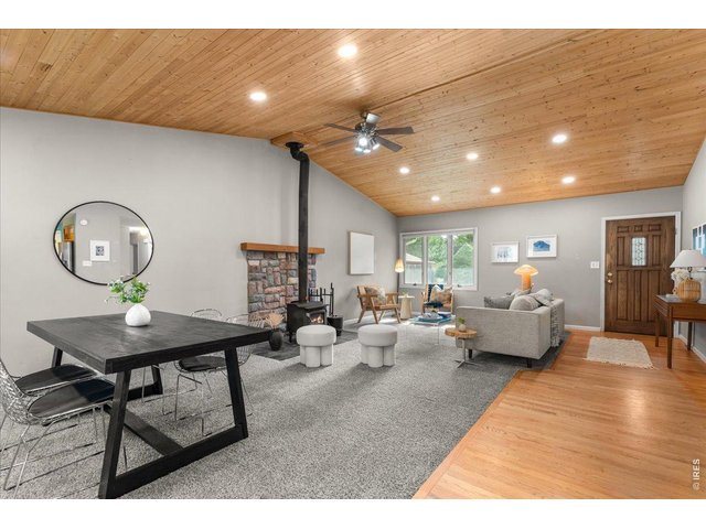 Property Photo 7 Tongue-and-groove wood ceiling with recessed LED lighting.