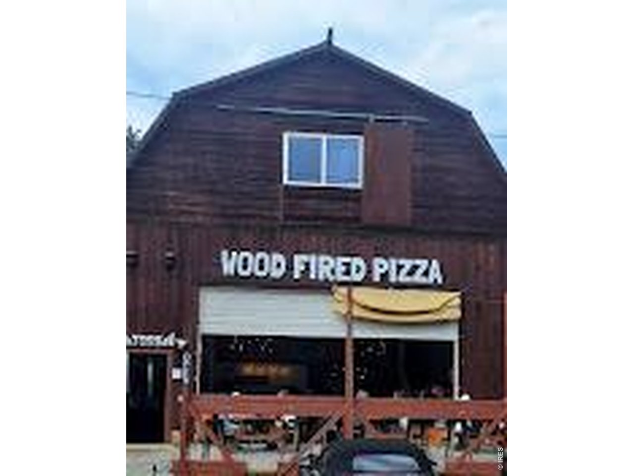 Property Photo 28 Toss Wood Fired Pizza down the street!