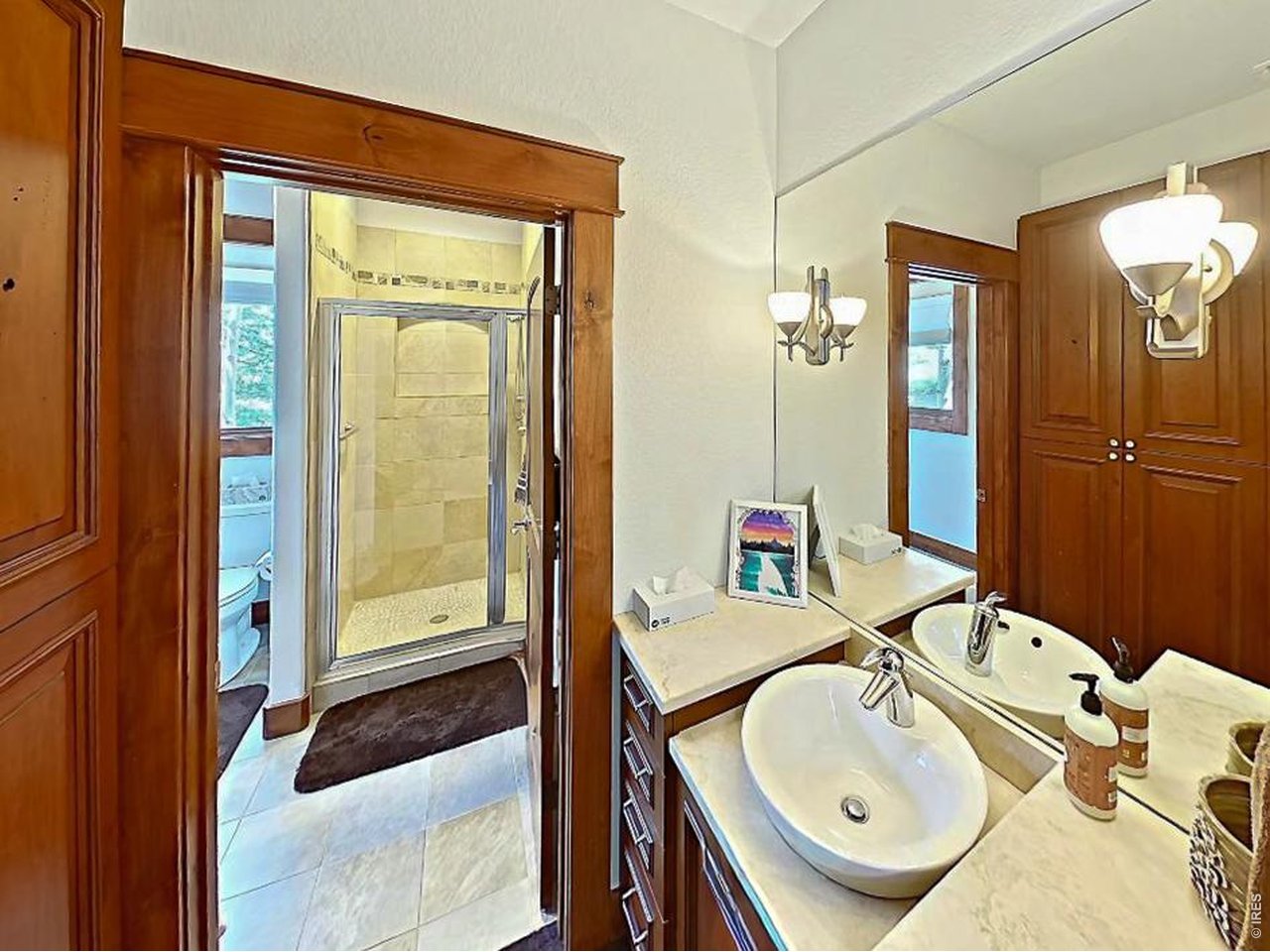 Property Photo 32 Private 3/4 bathroom for the second suite upper level.