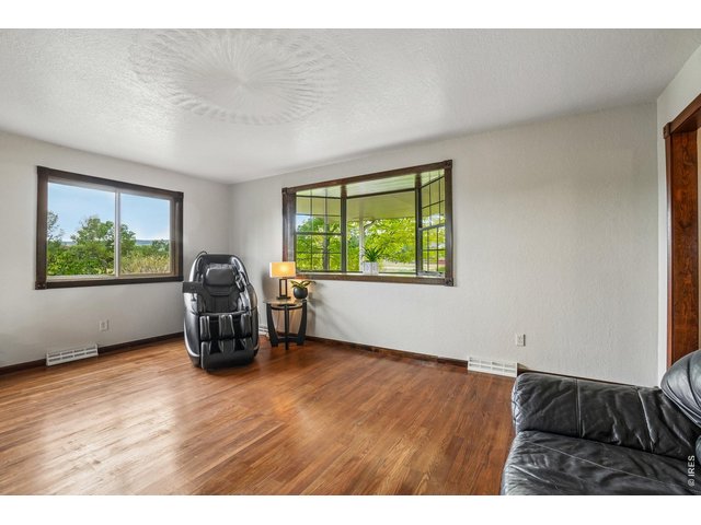 Property Photo 13 Formal living room, great space to read a book or welcome guests