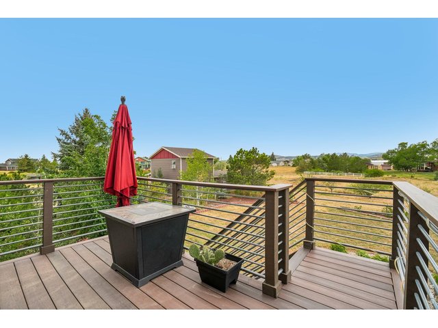 Property Photo 21 Private deck off the primary second story bedroom