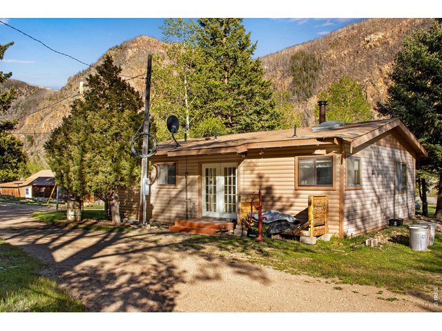Property Photo 6 Primary residence features 2 beds and 2 baths plus a large 4-car tandem detached garage