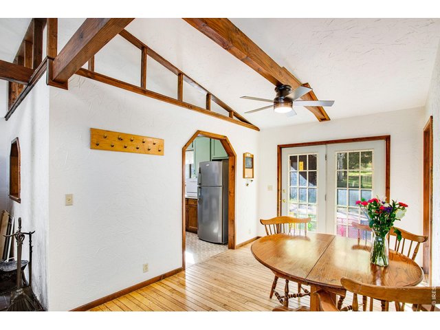 Property Photo 31 Primary residence features vaulted ceilings a wood stove and hardwood floors