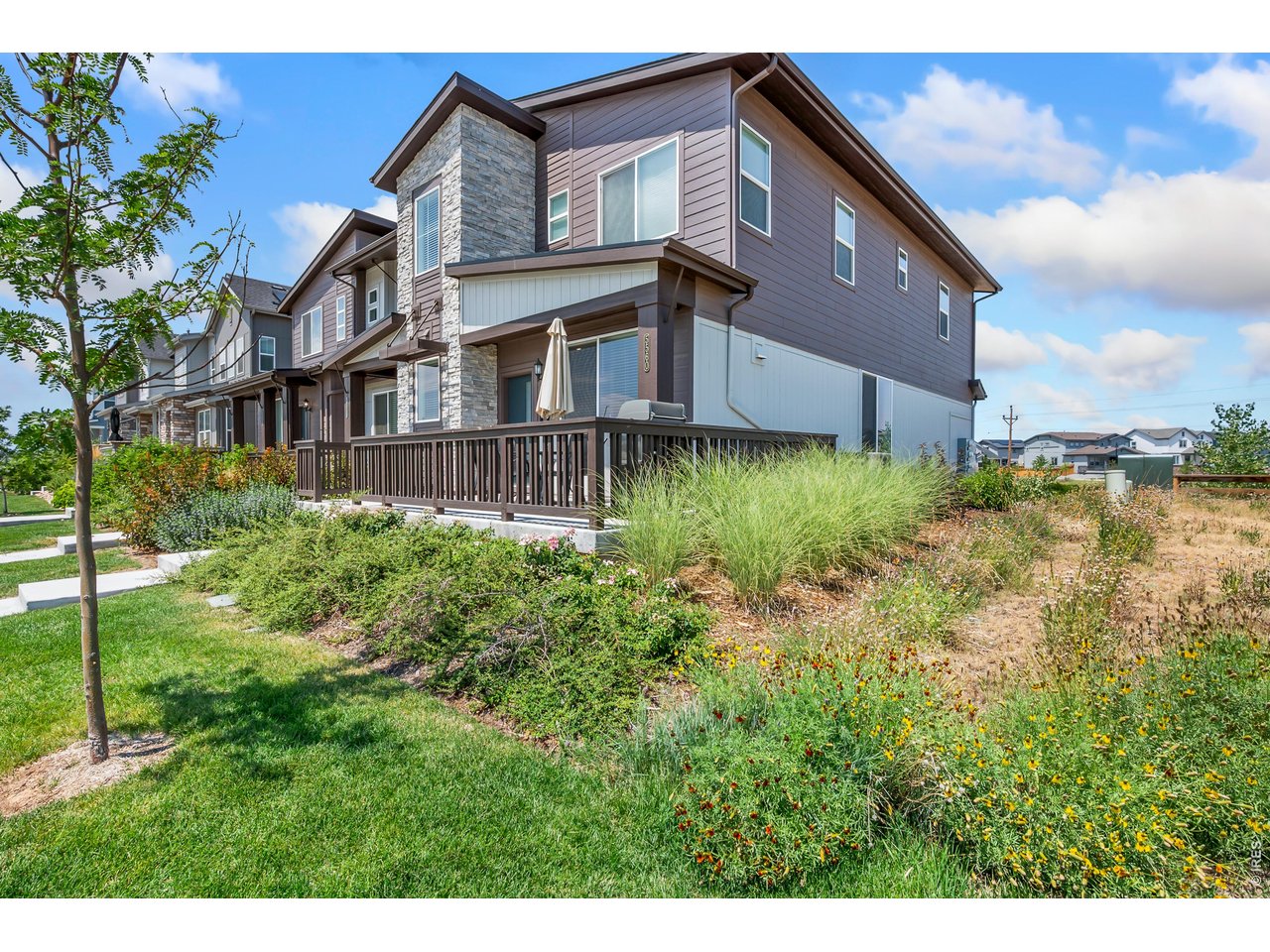 Property Photo 1 NEW PRICE! End-unit townhome in Timnath Landing built in 2024 and move-in ready.