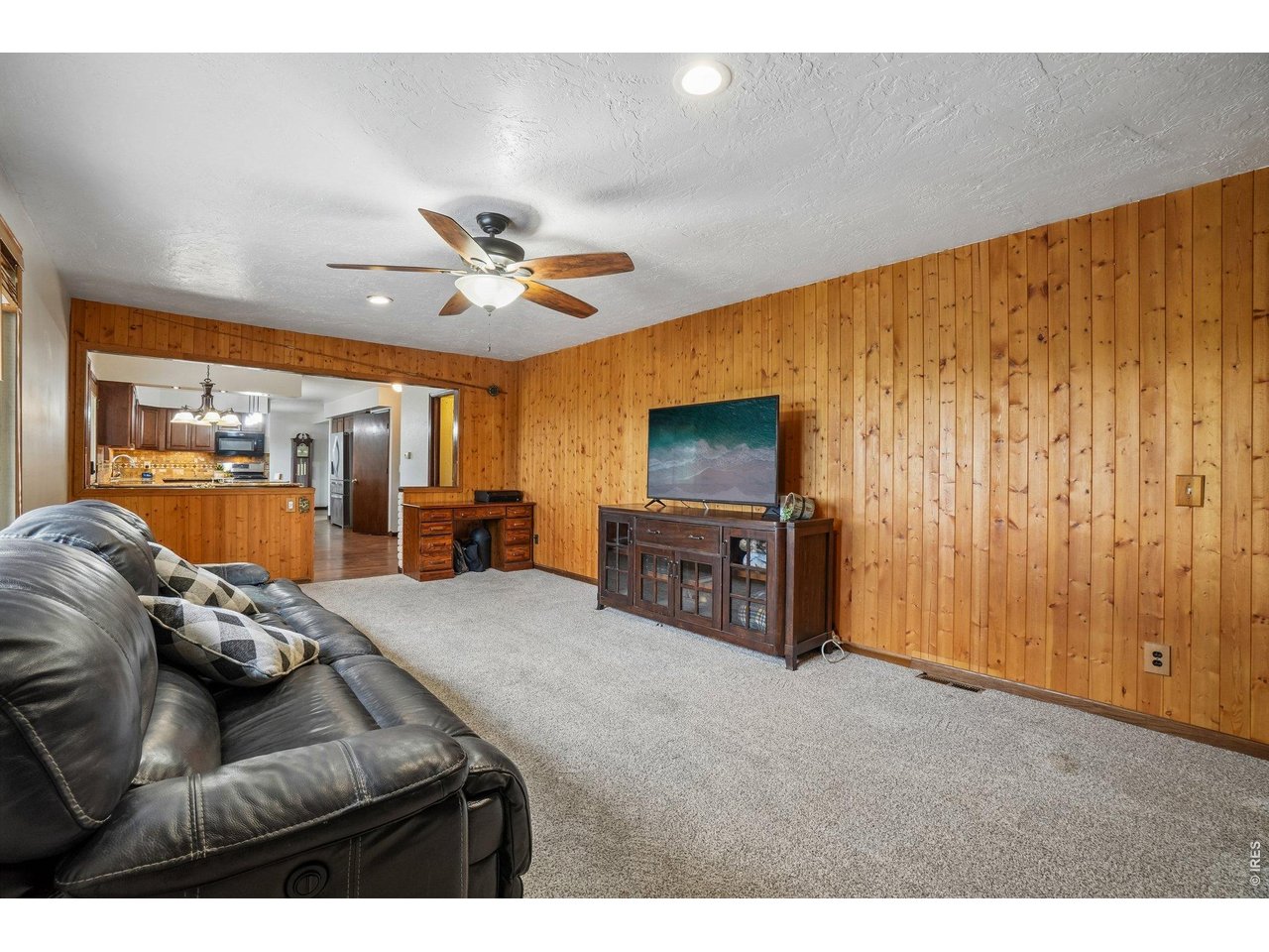 Property Photo 11 Kitchen, breakfast nook and large family room with fireplace.
