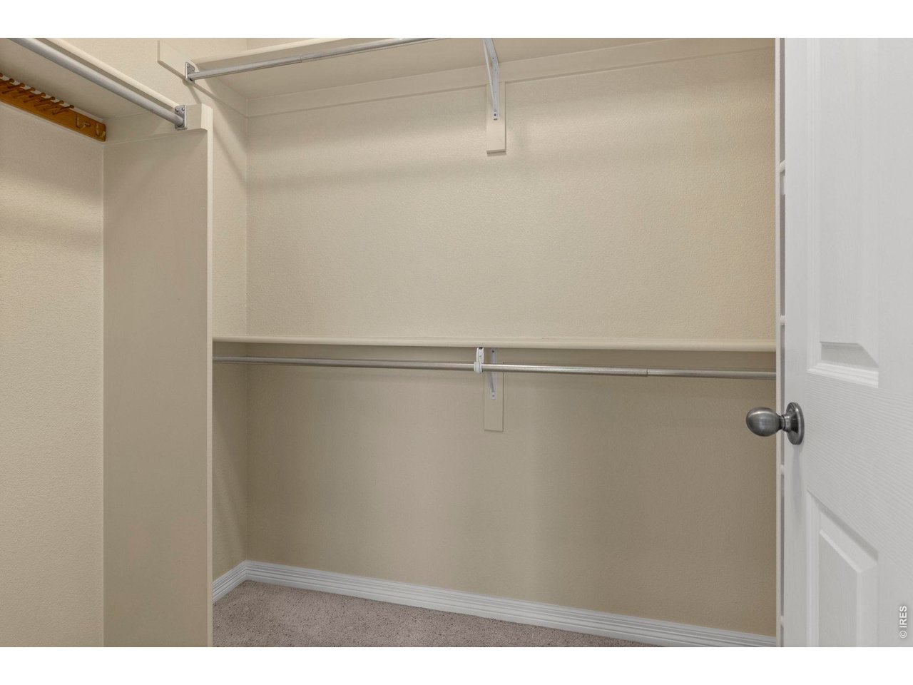 Property Photo 16 primary bedroom walk in closet