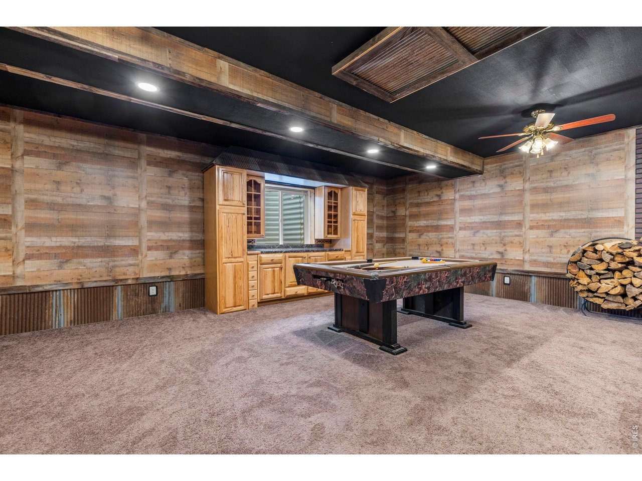Property Photo 21 beautiful rustic finished basement, pool table included