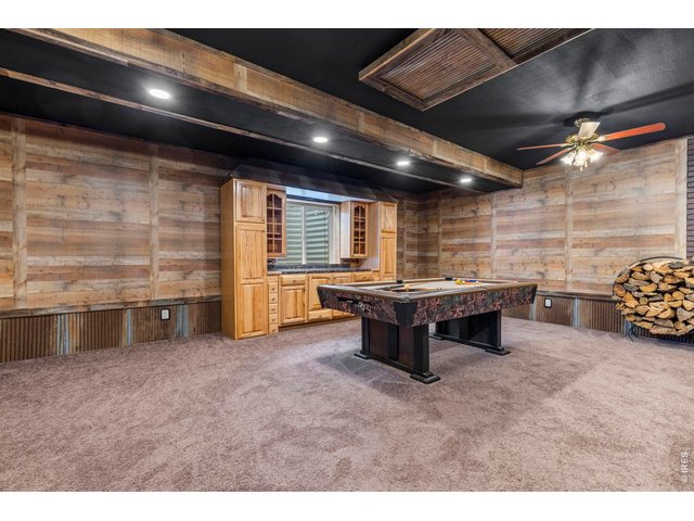 Property Photo 21 beautiful rustic finished basement, pool table included