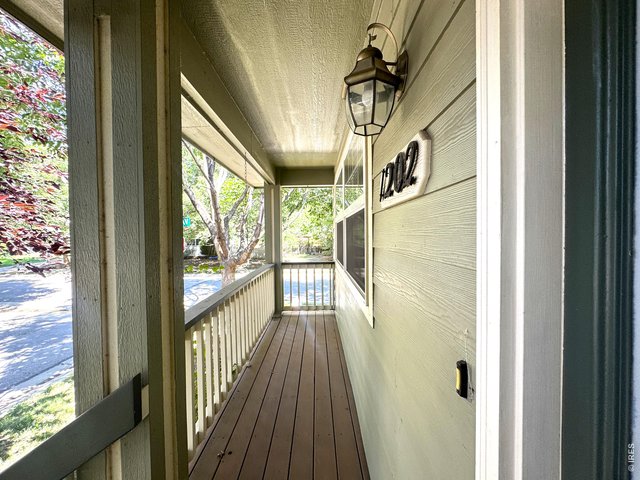 Property Photo 6 Long, covered patio