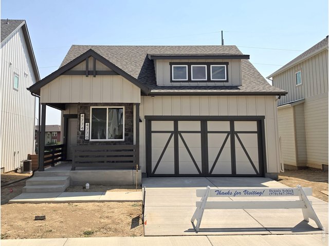 Property Photo 1 Photo of home previously built by the builder of the same floor plan and elevation