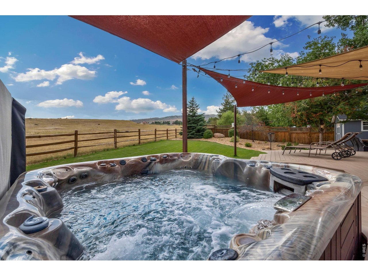Property Photo 43 Relax in the hot tub under the Colorado skies.