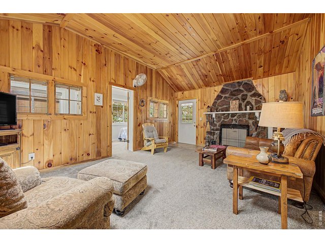 Property Photo 7 Main cabin great room with fireplace.