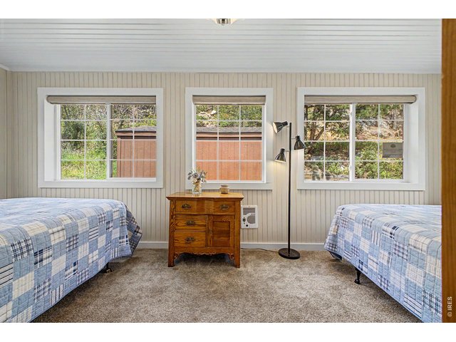 Property Photo 19 Guest bedroom has 2 double beds.