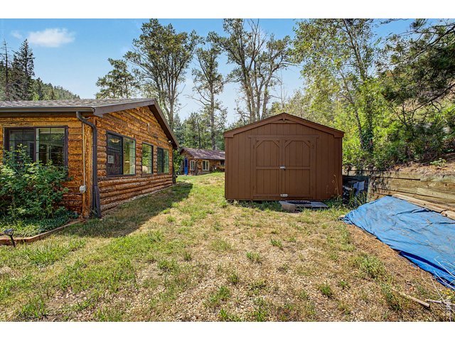 Property Photo 23 Right side of the cabin is the large shed/workshop.