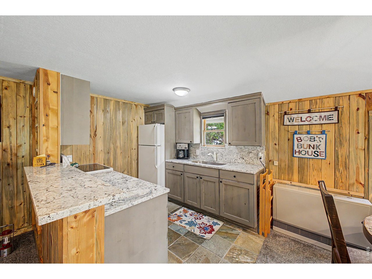 Property Photo 34 Granite counter tops and high end cabinets