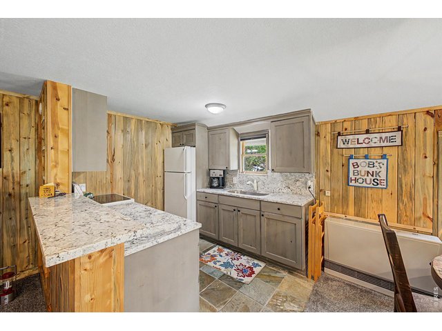 Property Photo 34 Granite counter tops and high end cabinets