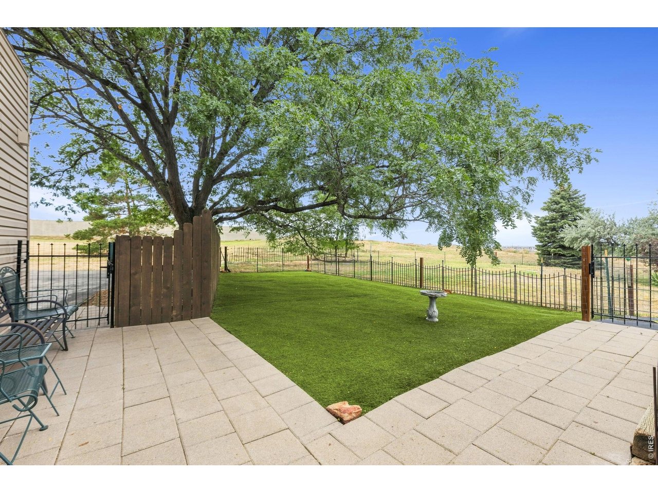 Property Photo 37 Fenced backyard space with astroturf and patio