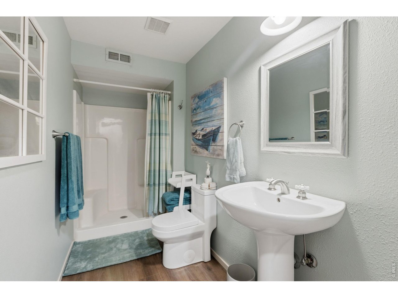 Property Photo 33 Downstairs bathroom gives guest privacy and family room convenience