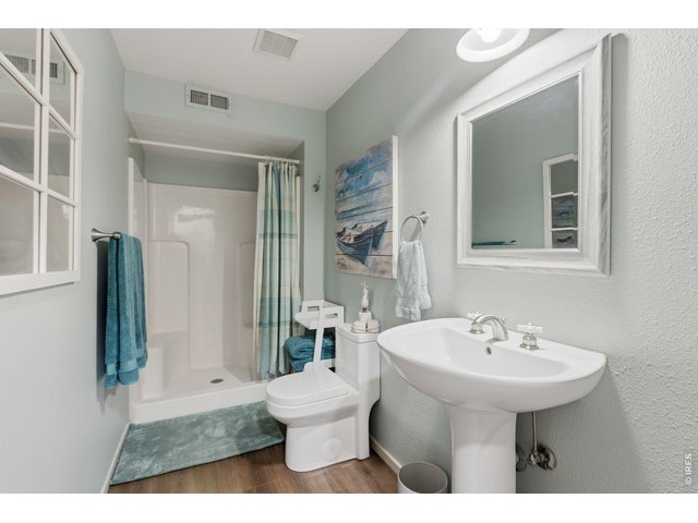 Property Photo 33 Downstairs bathroom gives guest privacy and family room convenience