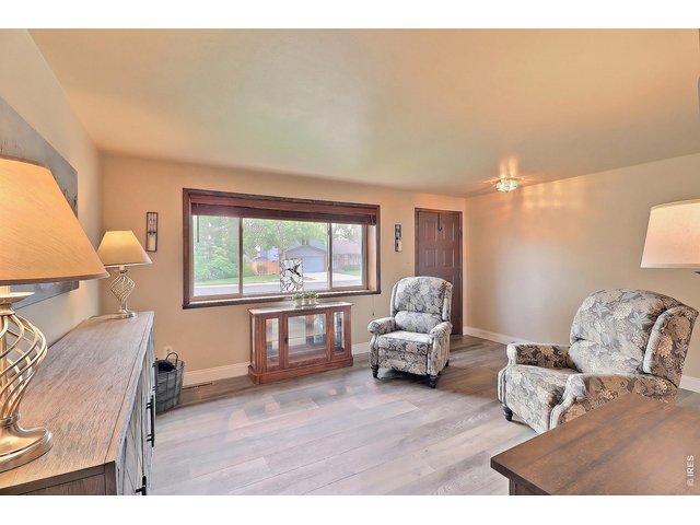 Property Photo 5 Front Entryway Opens to this Lovely Living Room